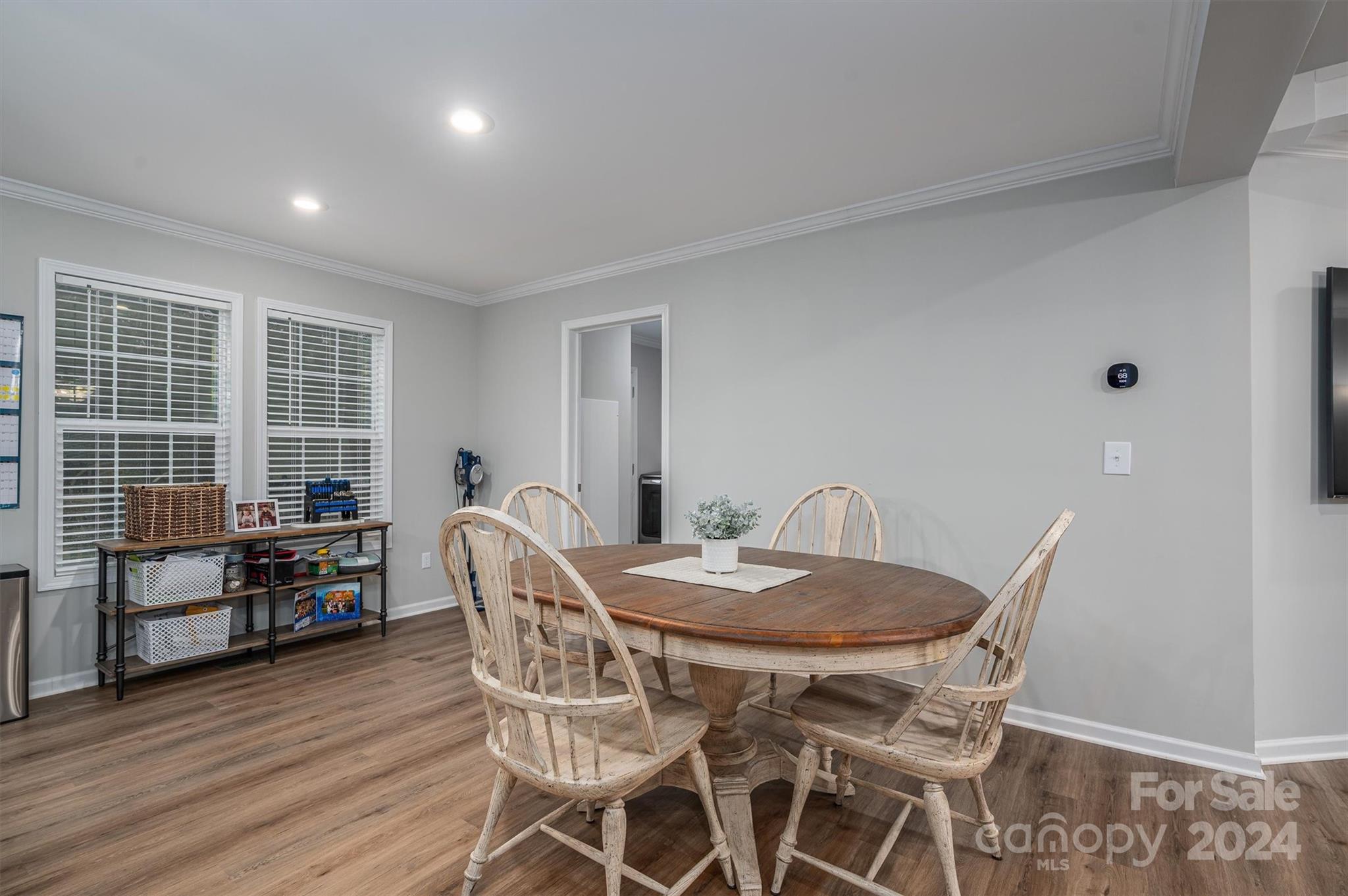 2388 Cat Square Road Vale, NC 28168 - Photo 19 of 33 a view of a dining room with furniture and wooden floor