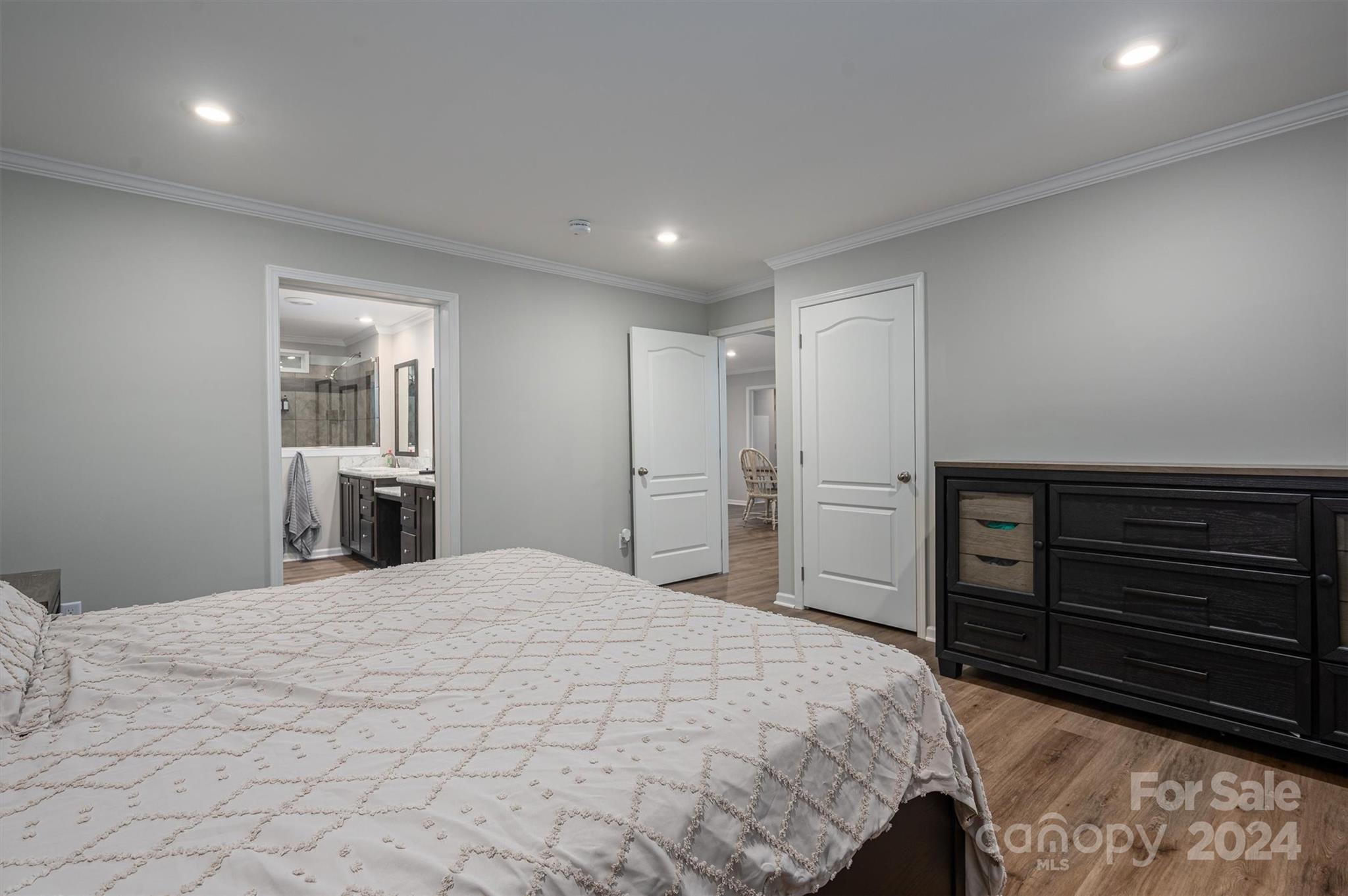 2388 Cat Square Road Vale, NC 28168 - Photo 21 of 33 a spacious bedroom with a bed and a dresser