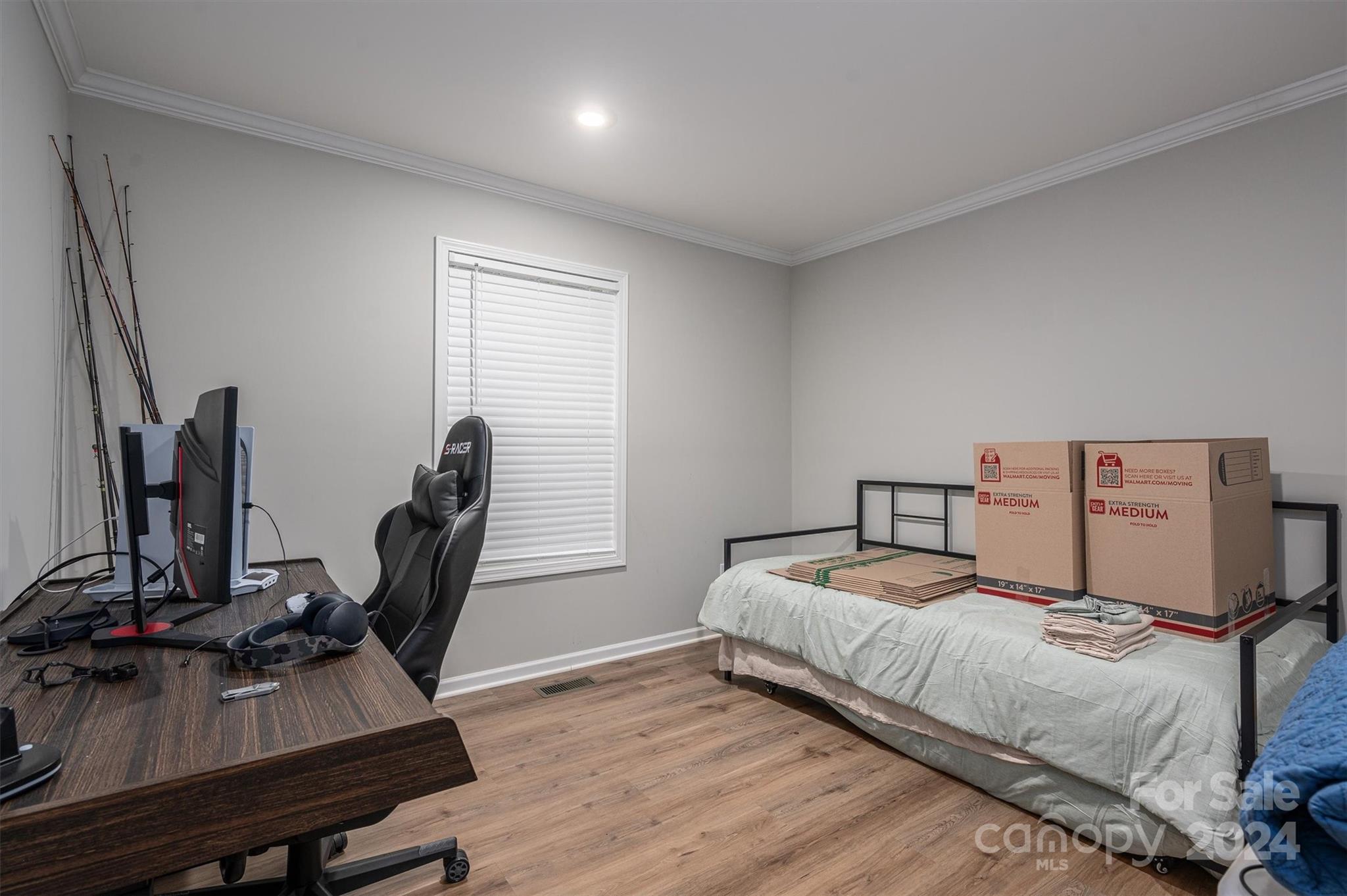 2388 Cat Square Road Vale, NC 28168 - Photo 26 of 33 a bedroom with a bed and a desk