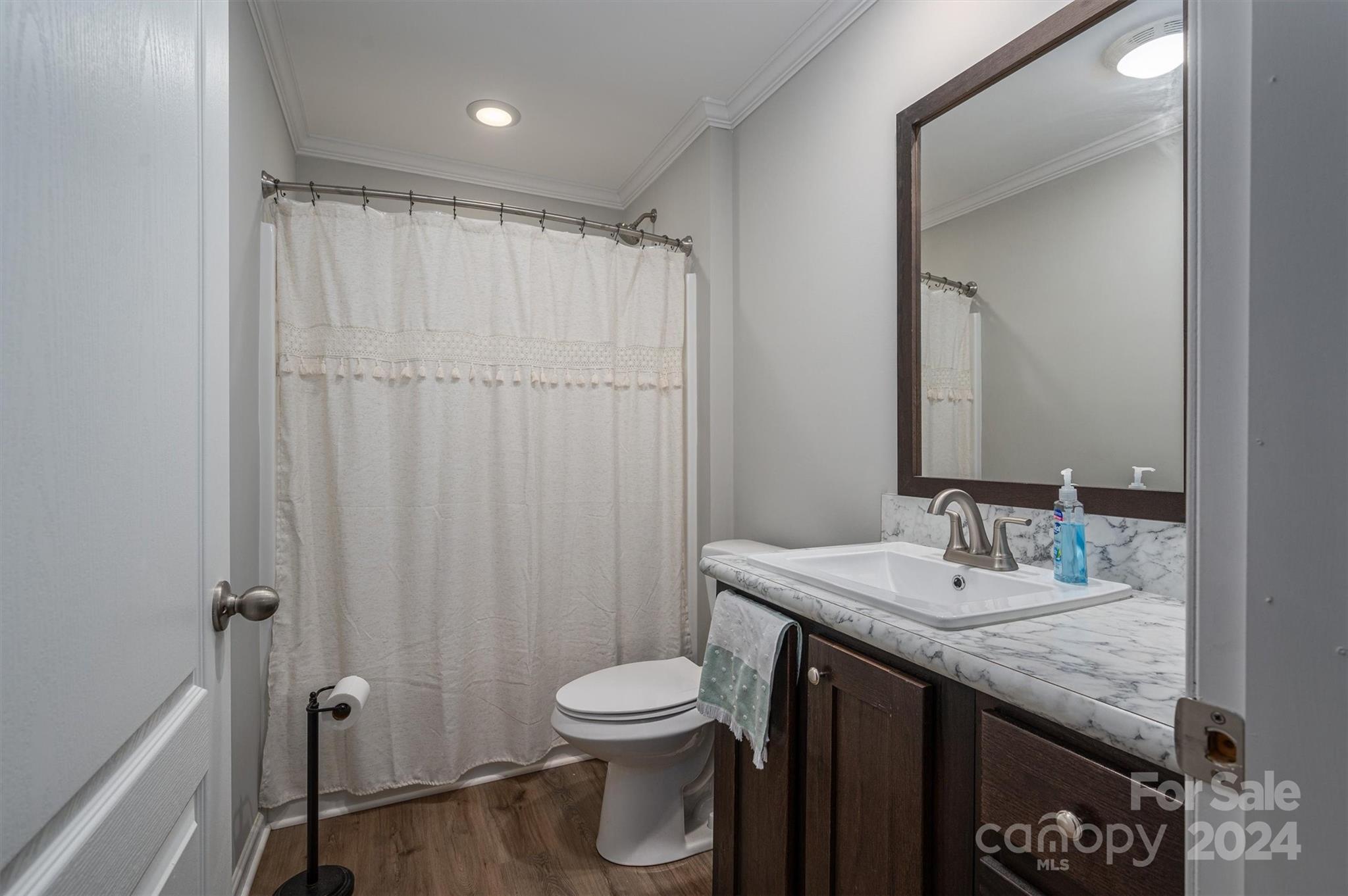 2388 Cat Square Road Vale, NC 28168 - Photo 28 of 33 a bathroom with a granite countertop sink toilet and shower