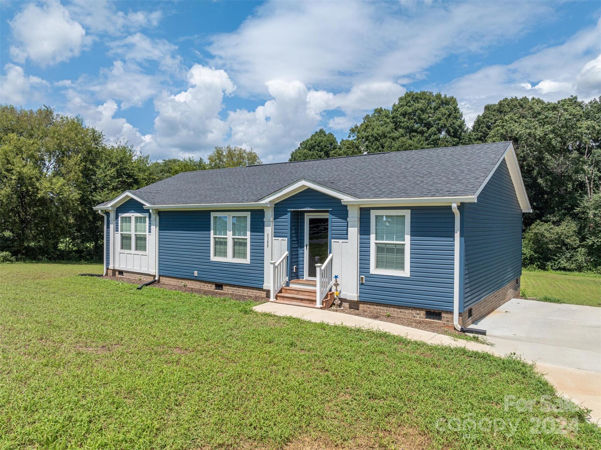 2388 Cat Square Road Vale, NC 28168 - Photo 31 of 33 front view of a house with a yard