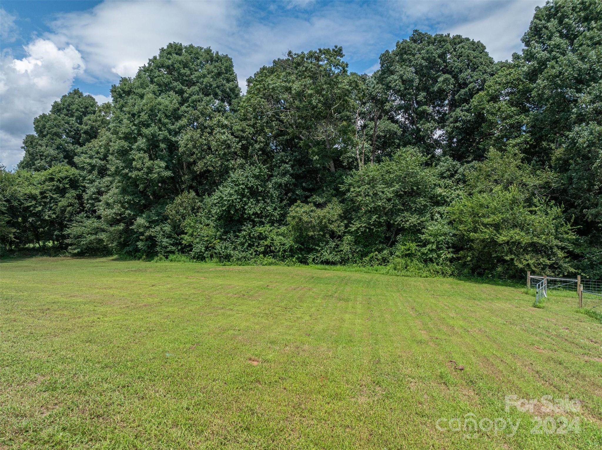 2388 Cat Square Road Vale, NC 28168 - Photo 32 of 33 a view of a field with an trees