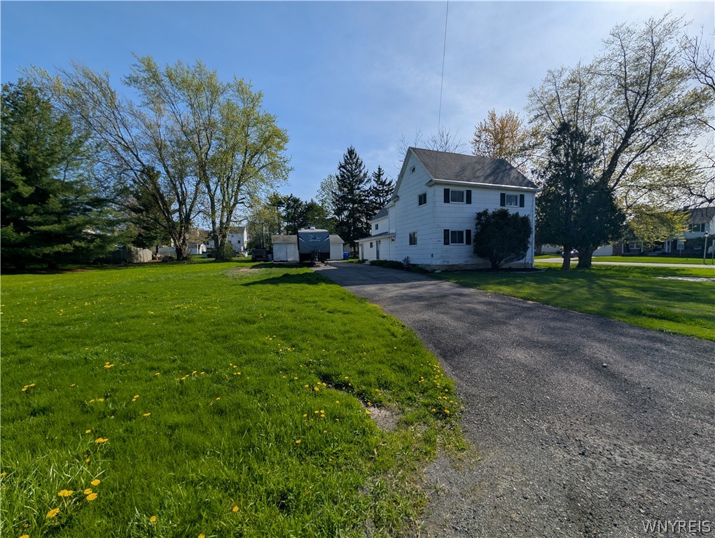 Exterior Left Side Driveway and Front to Unit 1 an