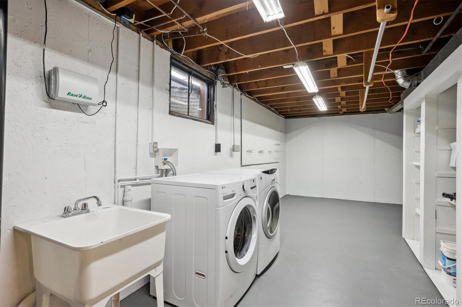 6300 Janice Way Arvada, CO 80004 - Photo 27 of 33 a utility room with dryer and washer