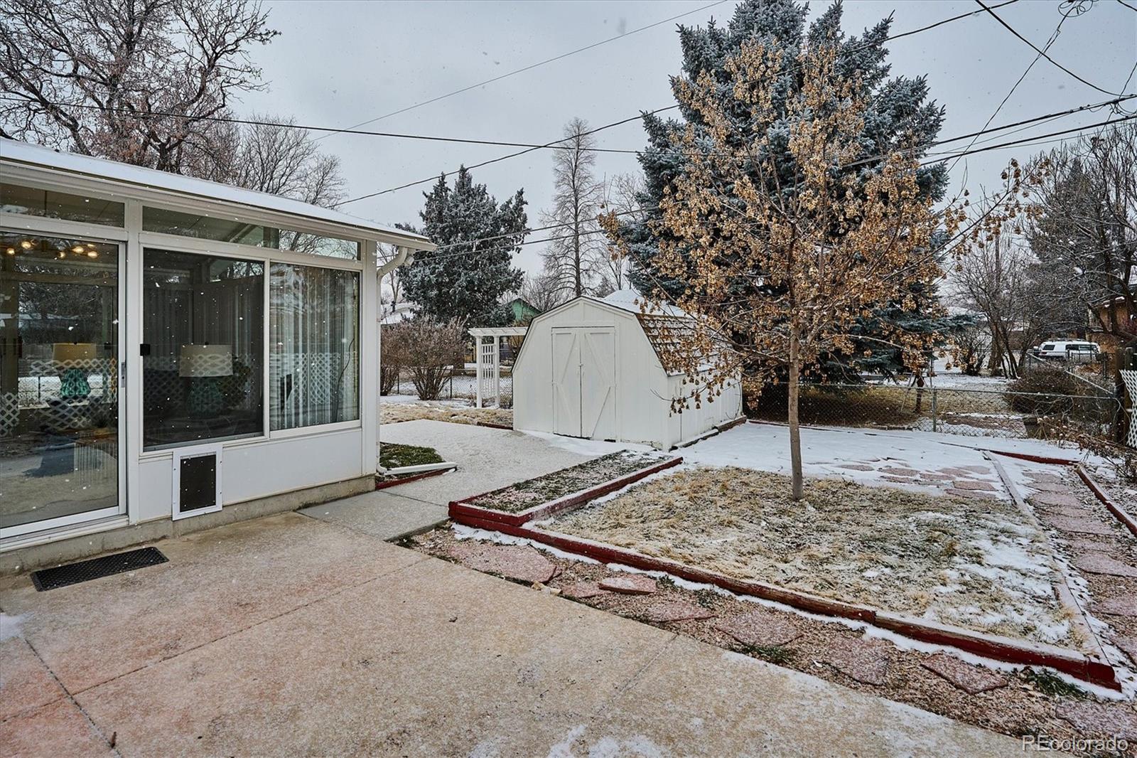 6300 Janice Way Arvada, CO 80004 - Photo 28 of 33 a outdoor space with a tree in the background