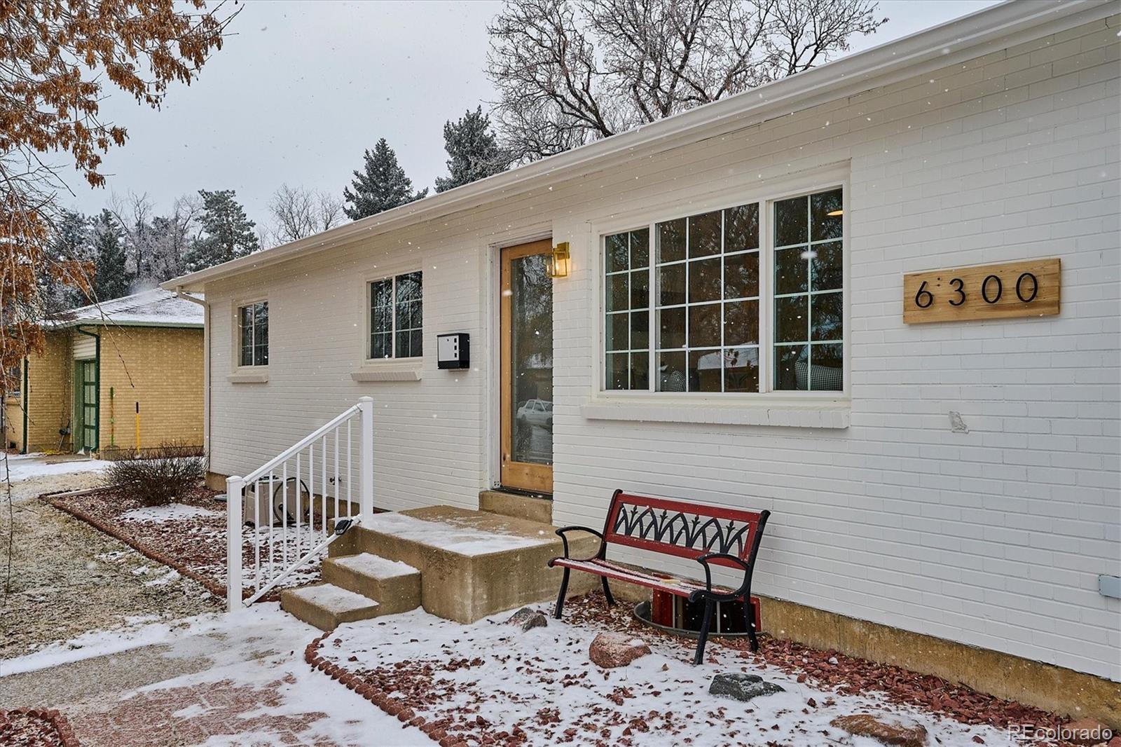 6300 Janice Way Arvada, CO 80004 - Photo 33 of 33 a view of a house with backyard and sitting area