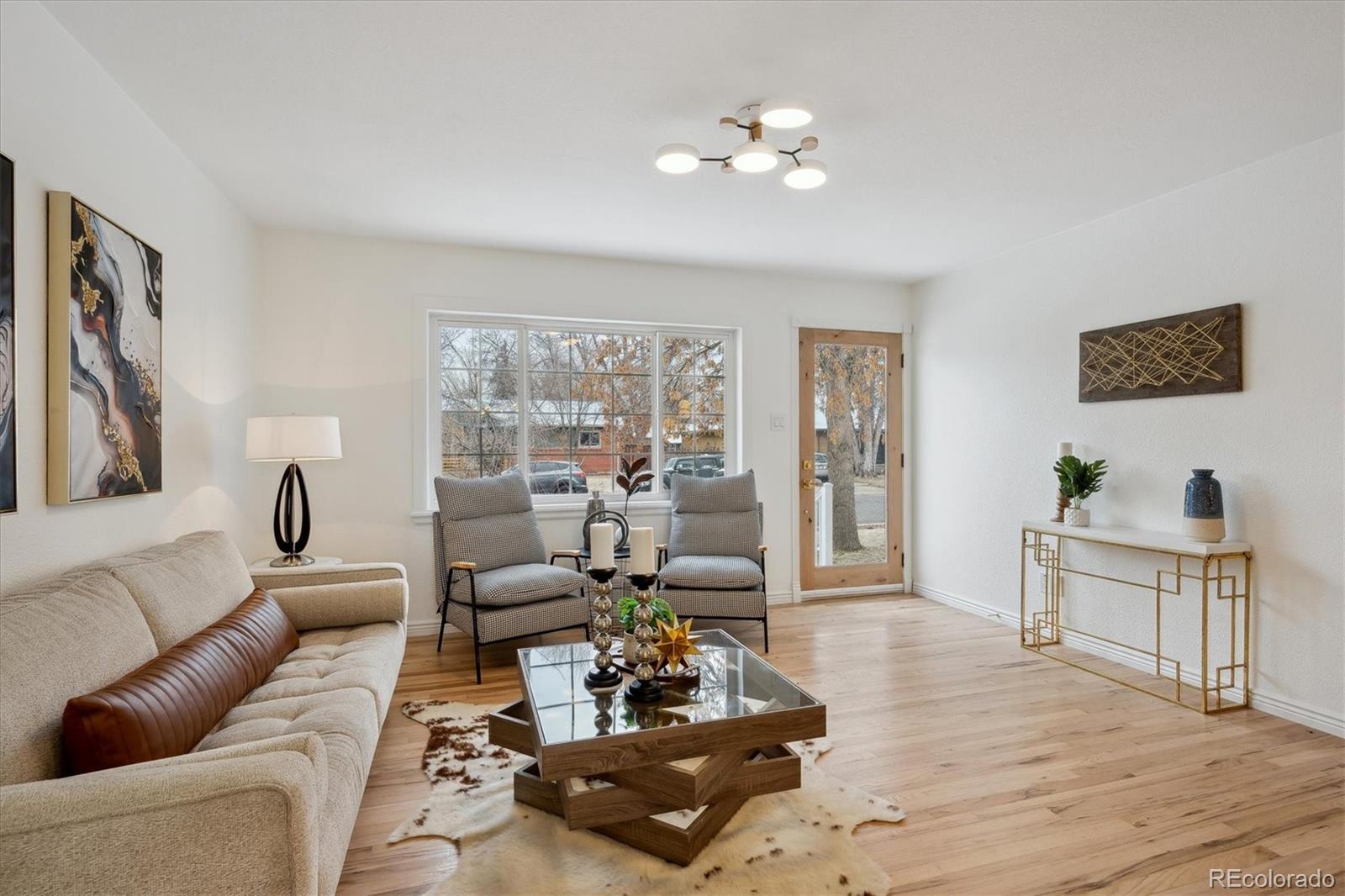 6300 Janice Way Arvada, CO 80004 - Photo 5 of 33 a living room with furniture