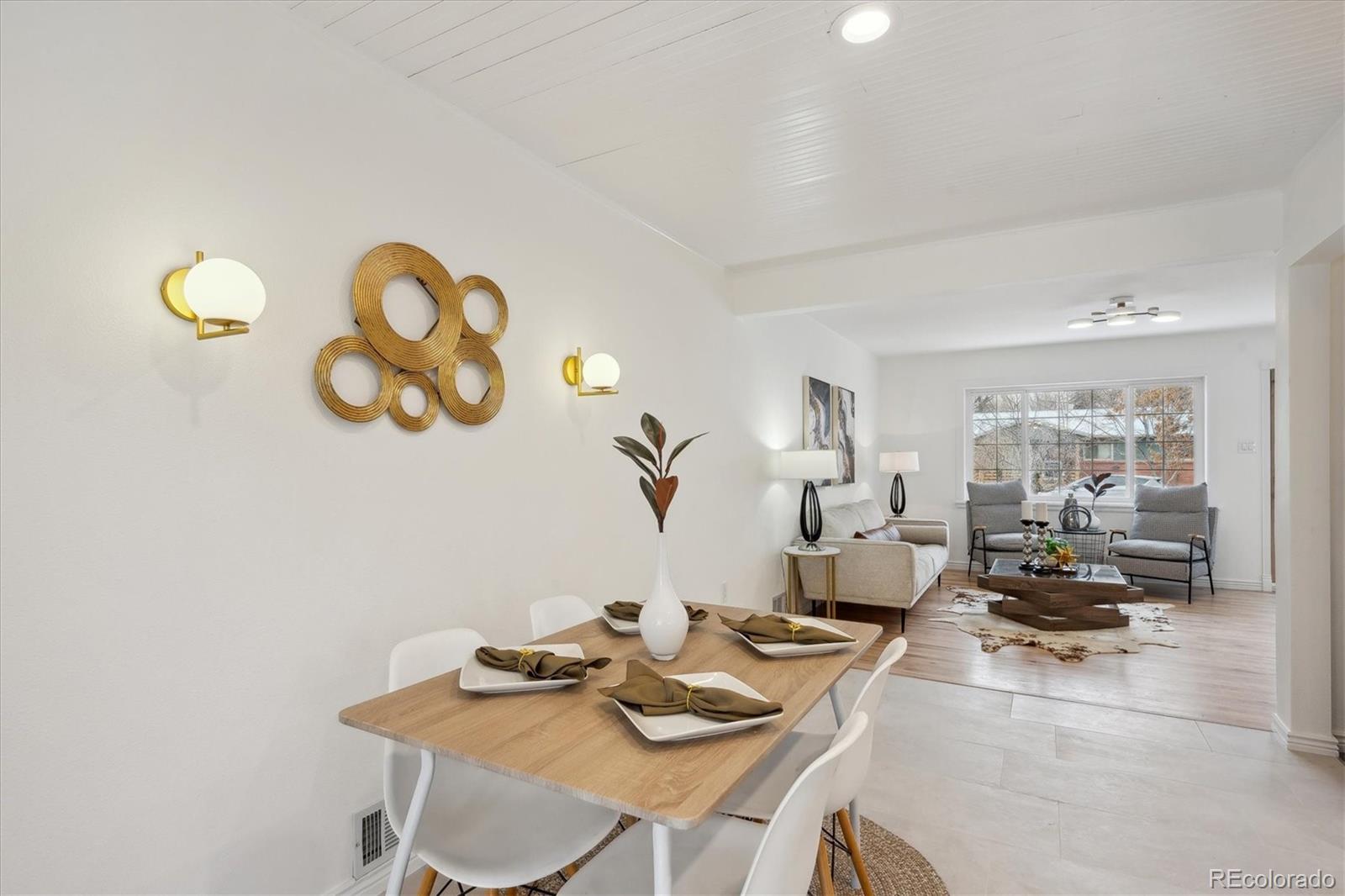 6300 Janice Way Arvada, CO 80004 - Photo 10 of 33 a living room with furniture and a table