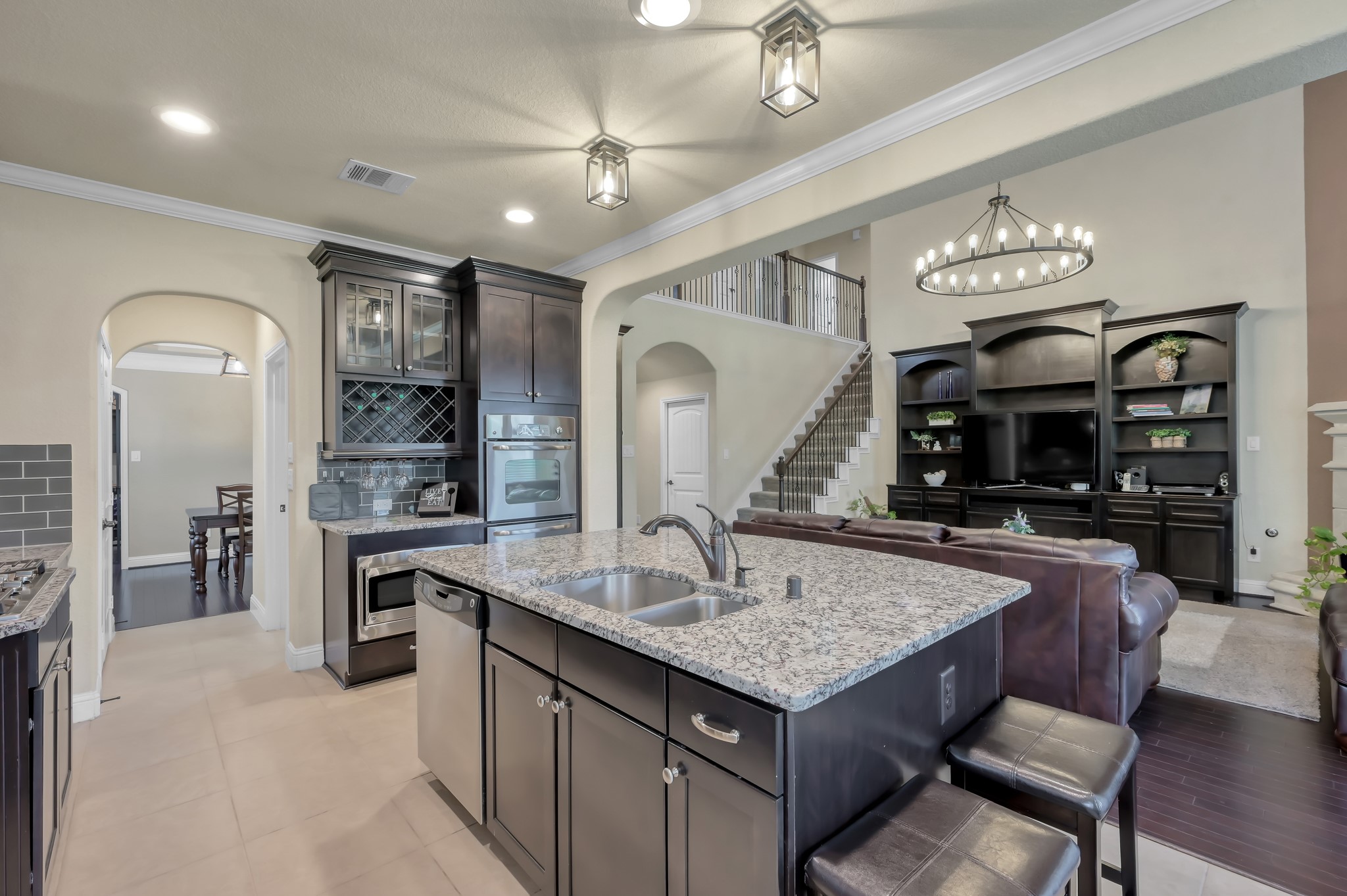 23 Rancher's Trail Tomball, TX 77375 - Photo 11 of 40 Kitchen is equipped with double stainless steel ovens and granite countertops.