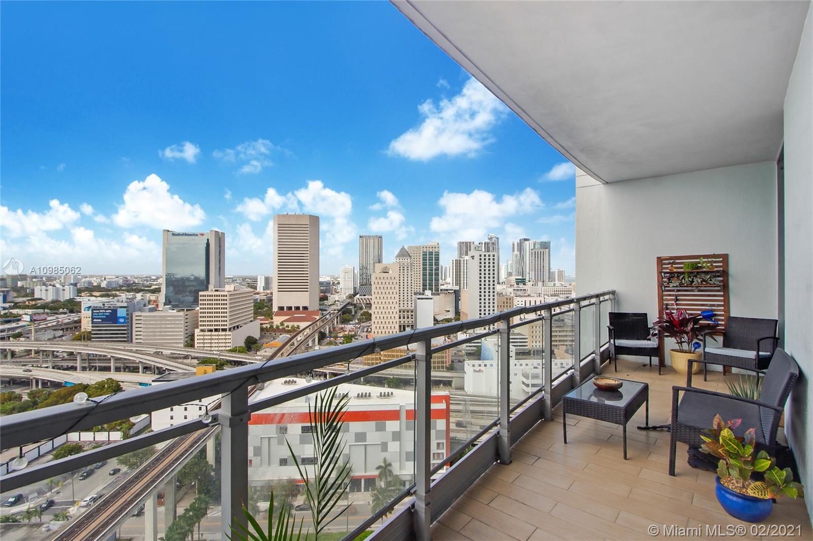90 Southwest 3rd Street, Unit 2406 Miami, FL 33130 - Photo 10 of 12 a view of swimming pool with outdoor seating