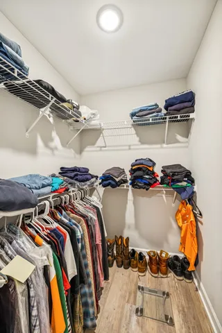 a front view of a house with yard and seating space