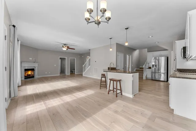 a kitchen with a sink a counter space and stainless steel appliances