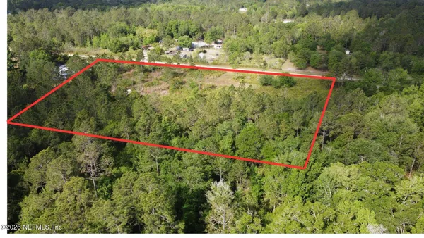 a view of a flower garden with a small park