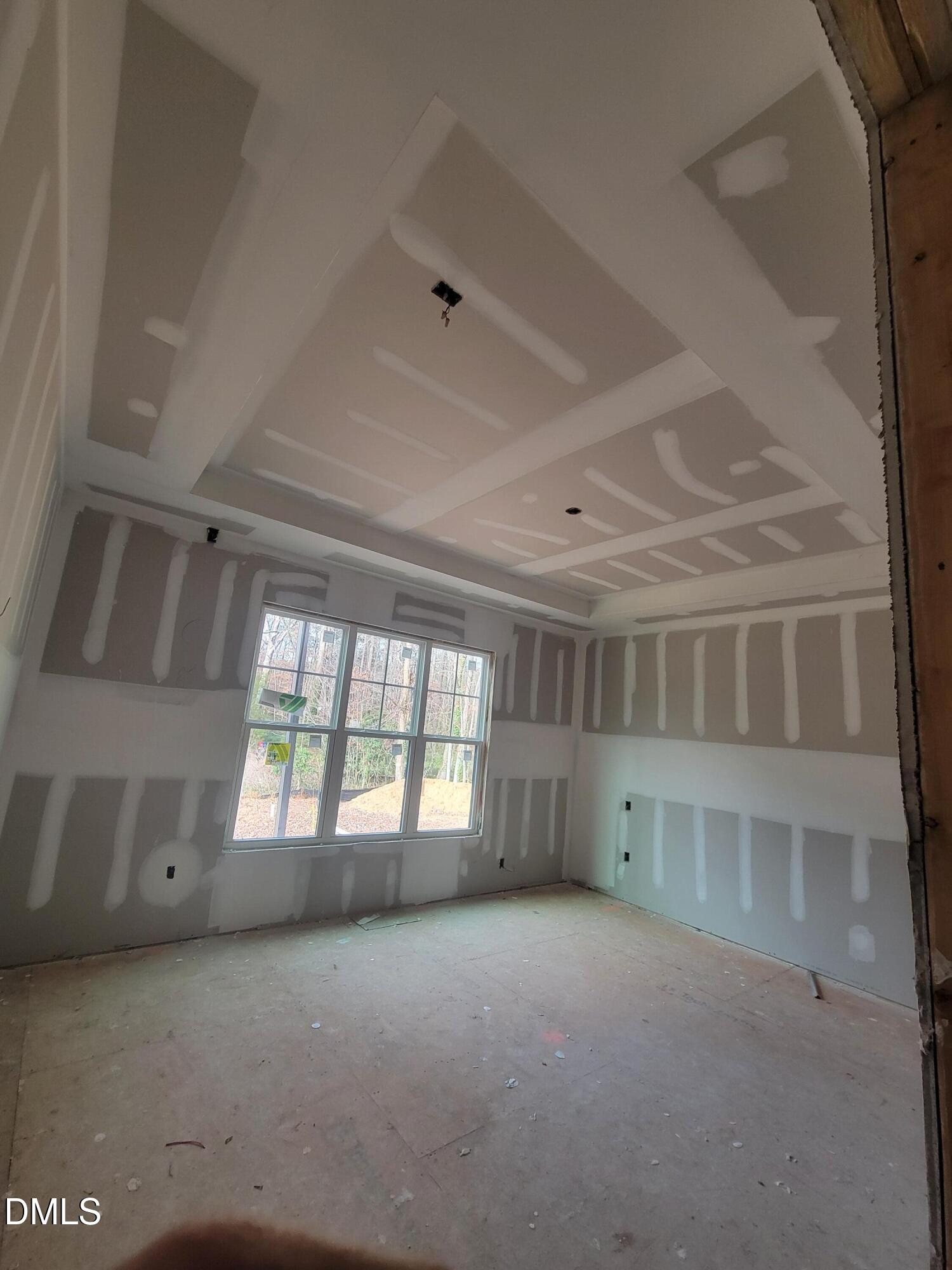 8721 Little Deer Lane Raleigh, NC 27613 - Photo 11 of 19 a view of an empty room with a window