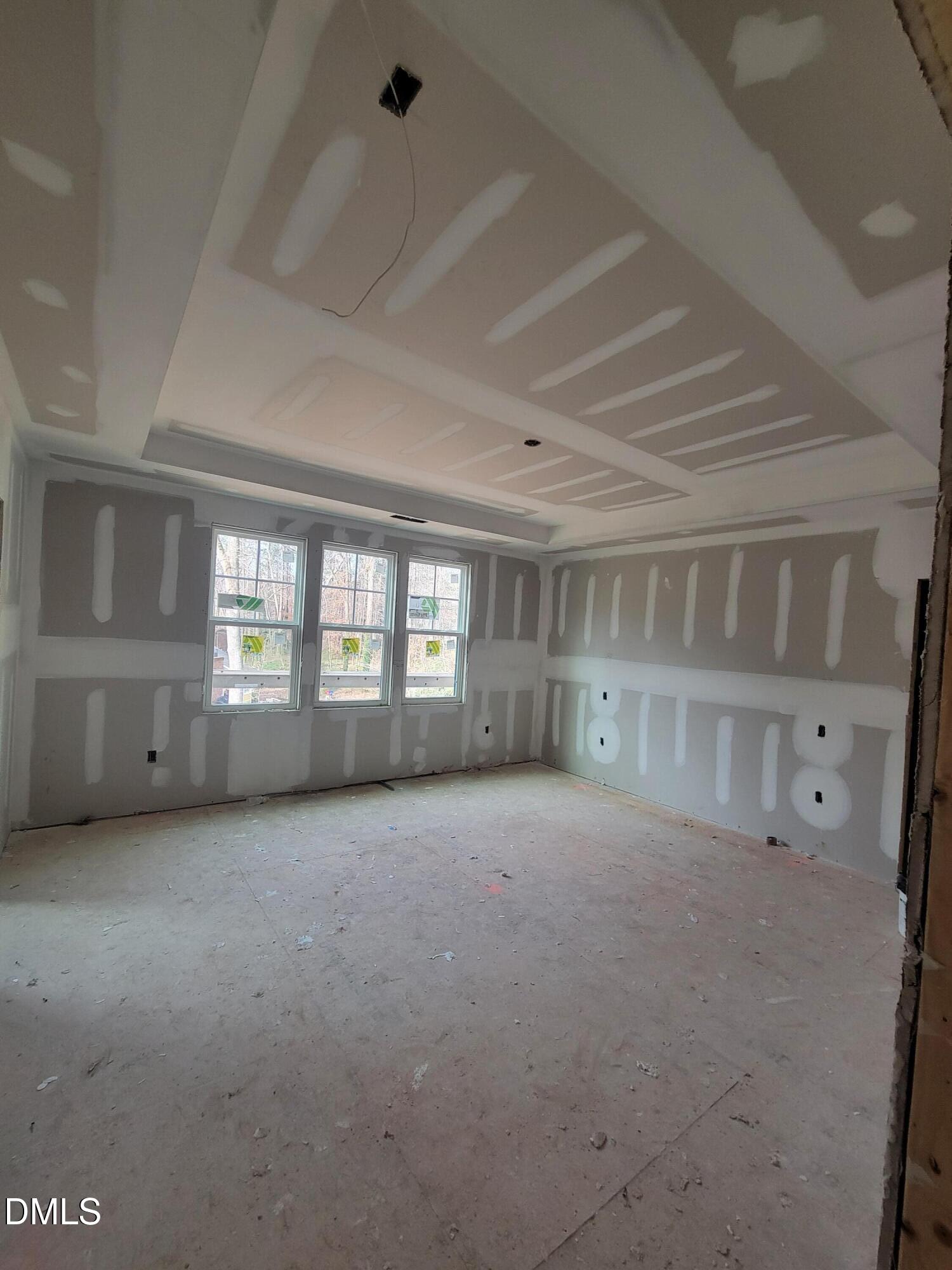 8721 Little Deer Lane Raleigh, NC 27613 - Photo 13 of 19 a view of an empty room with a window