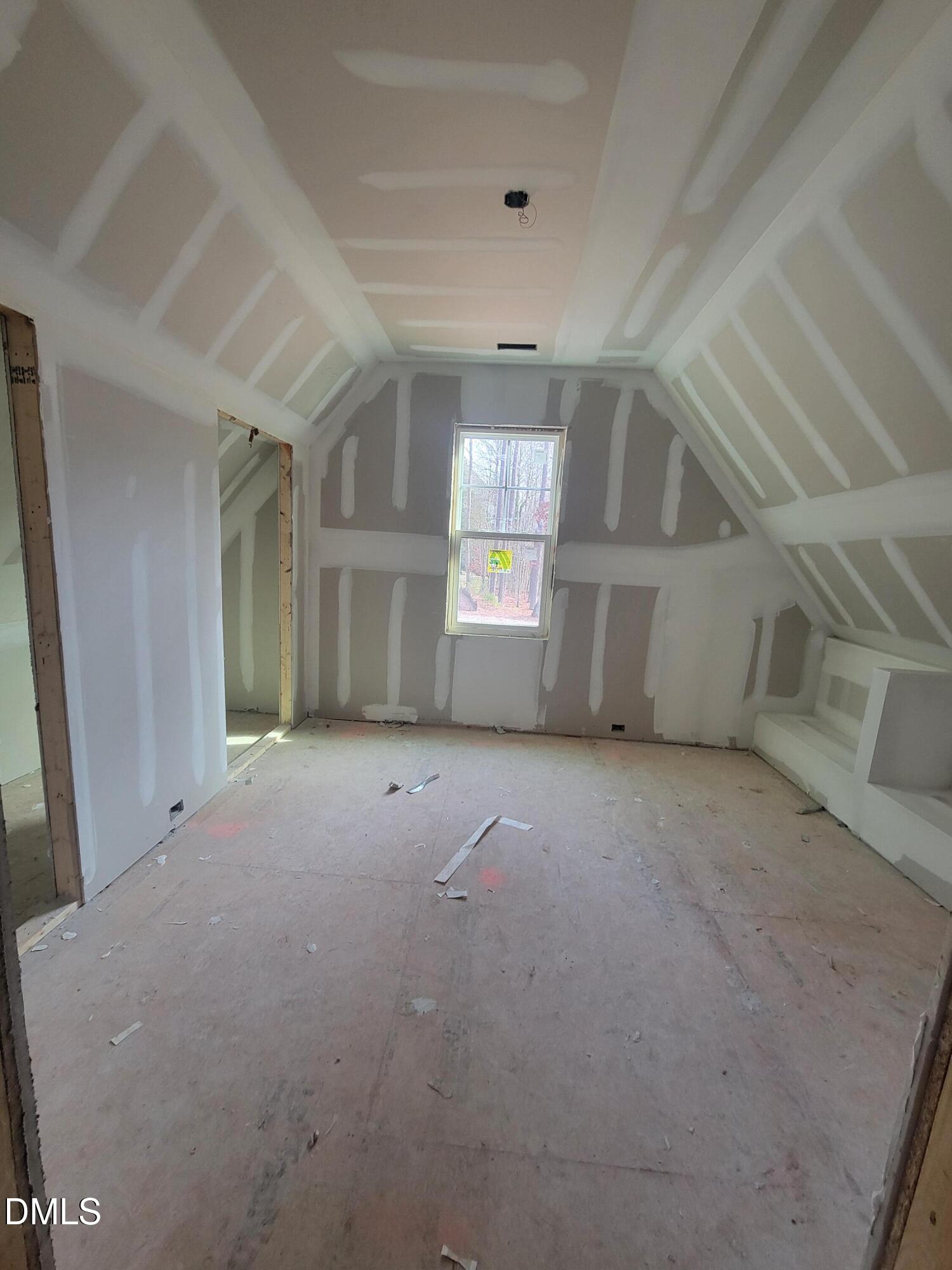 8721 Little Deer Lane Raleigh, NC 27613 - Photo 16 of 19 a view of empty room with windows