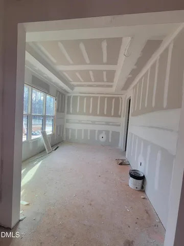 a view of the house with that has a yard