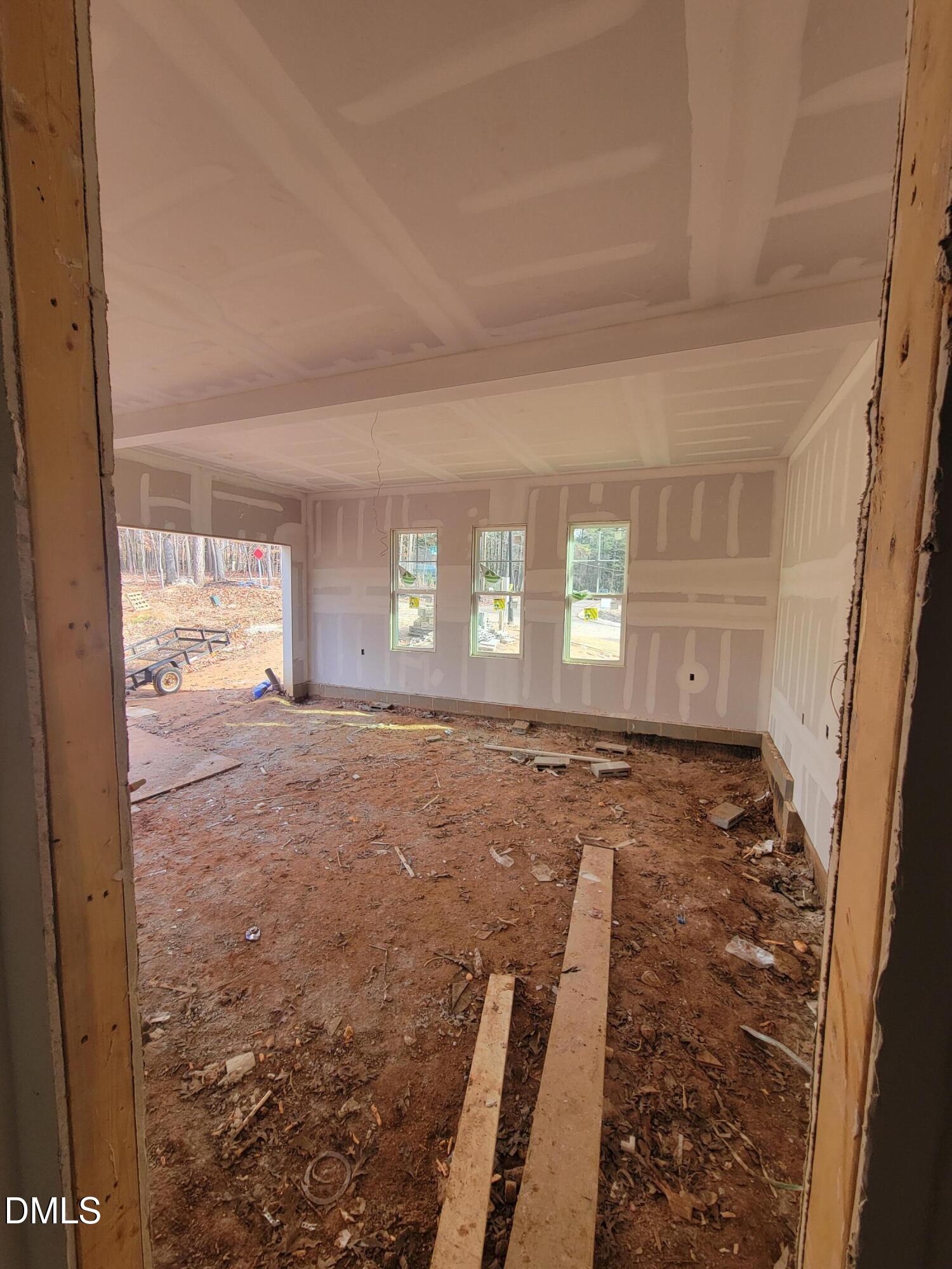 8721 Little Deer Lane Raleigh, NC 27613 - Photo 18 of 19 a view of empty room with window