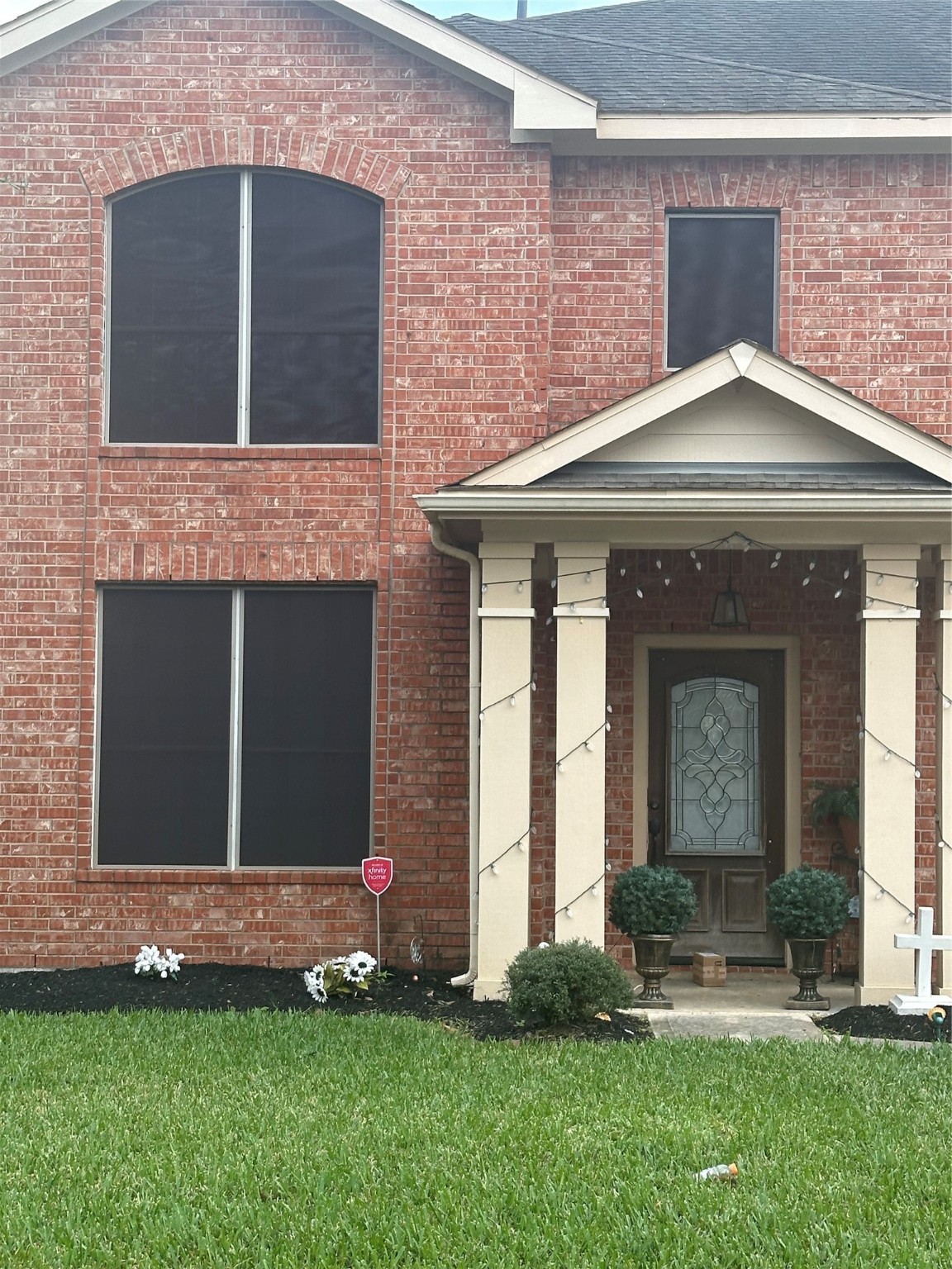 16122 Hidden Crest Drive Houston, TX 77049 - Photo 8 of 8 a front view of a house with a yard and garage
