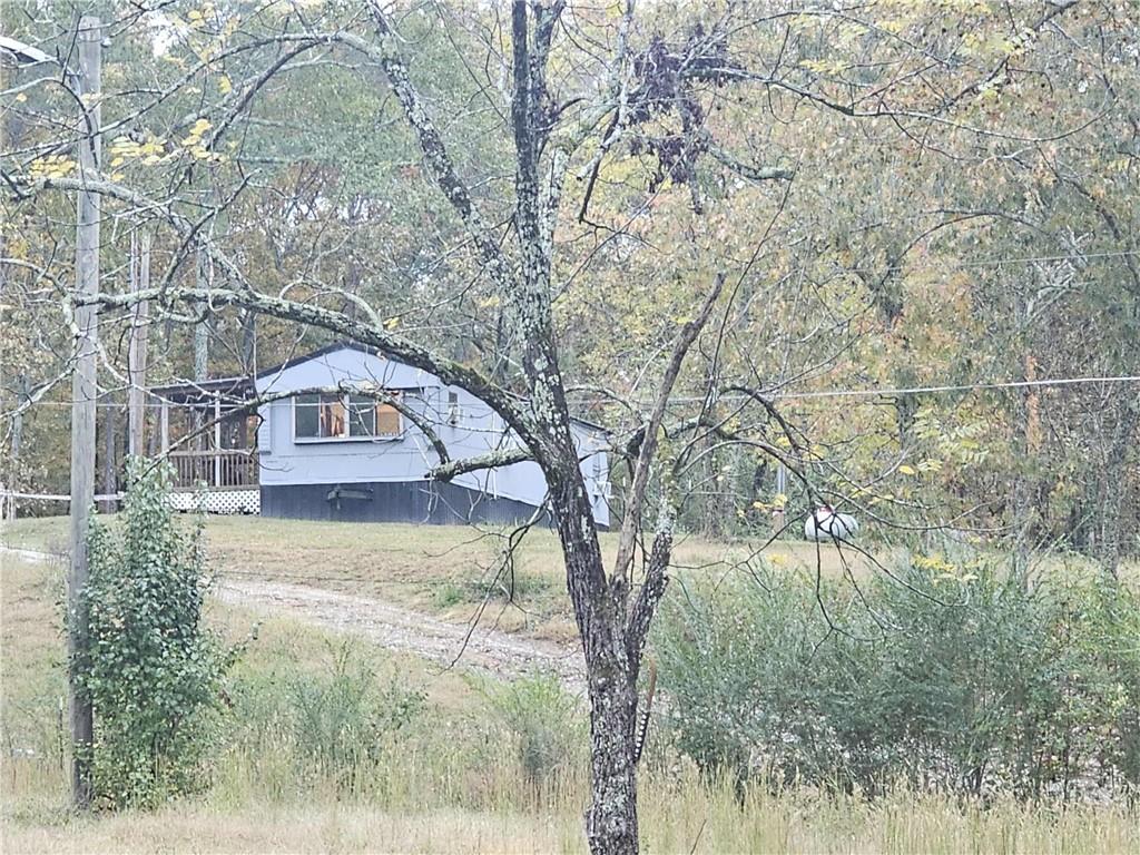 2081 Blacks Bluff Road Southwest Rome, GA 30161 - Photo 4 of 13 a view of a back yard of the house
