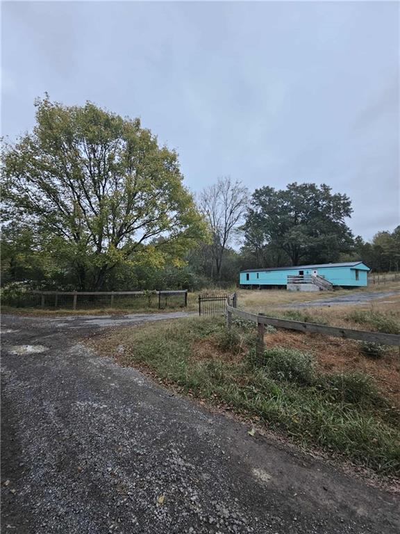 2081 Blacks Bluff Road Southwest Rome, GA 30161 - Photo 9 of 13 a view of outdoor space with green field and trees