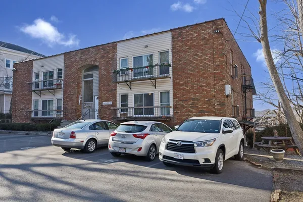 a car parked in front of a building