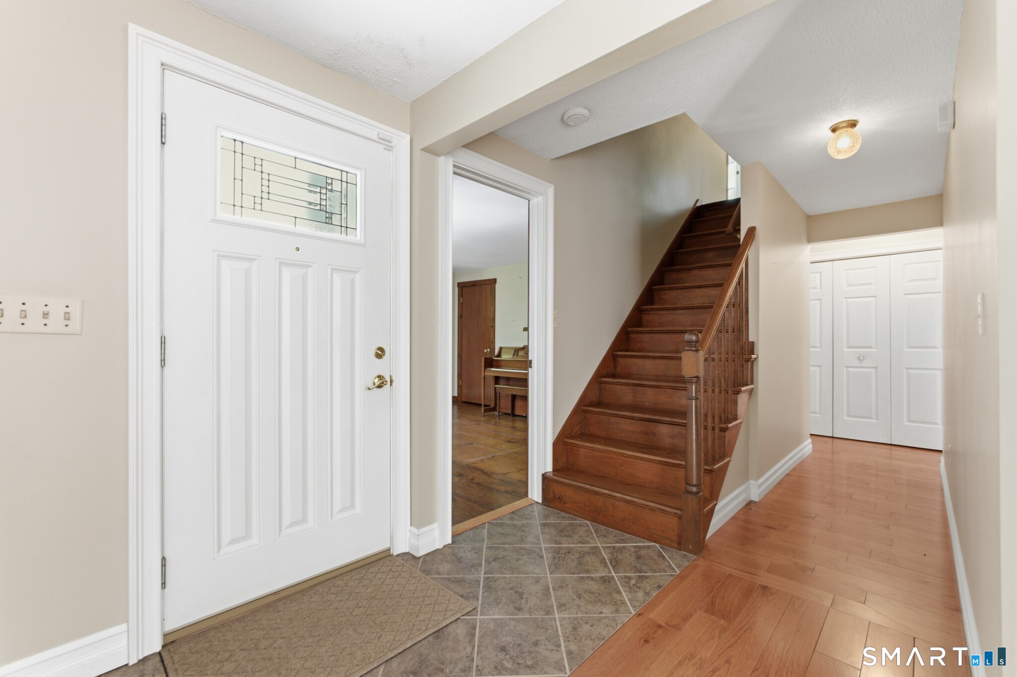 70 Mahoney Road Colchester, CT 06415 - Photo 13 of 40 an entryway with a white walls and stairs