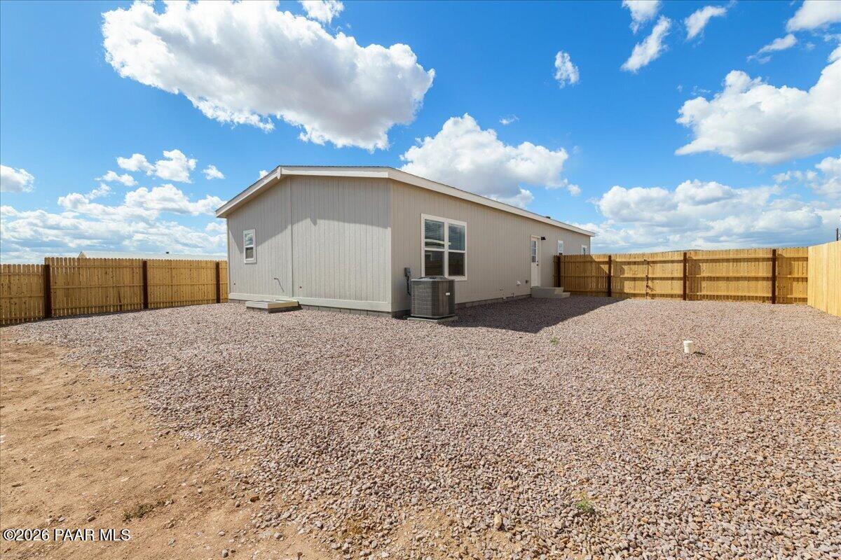 65 Hawaii Road Paulden, AZ 86334 - Photo 25 of 29 a view of a house with a snow in the yard