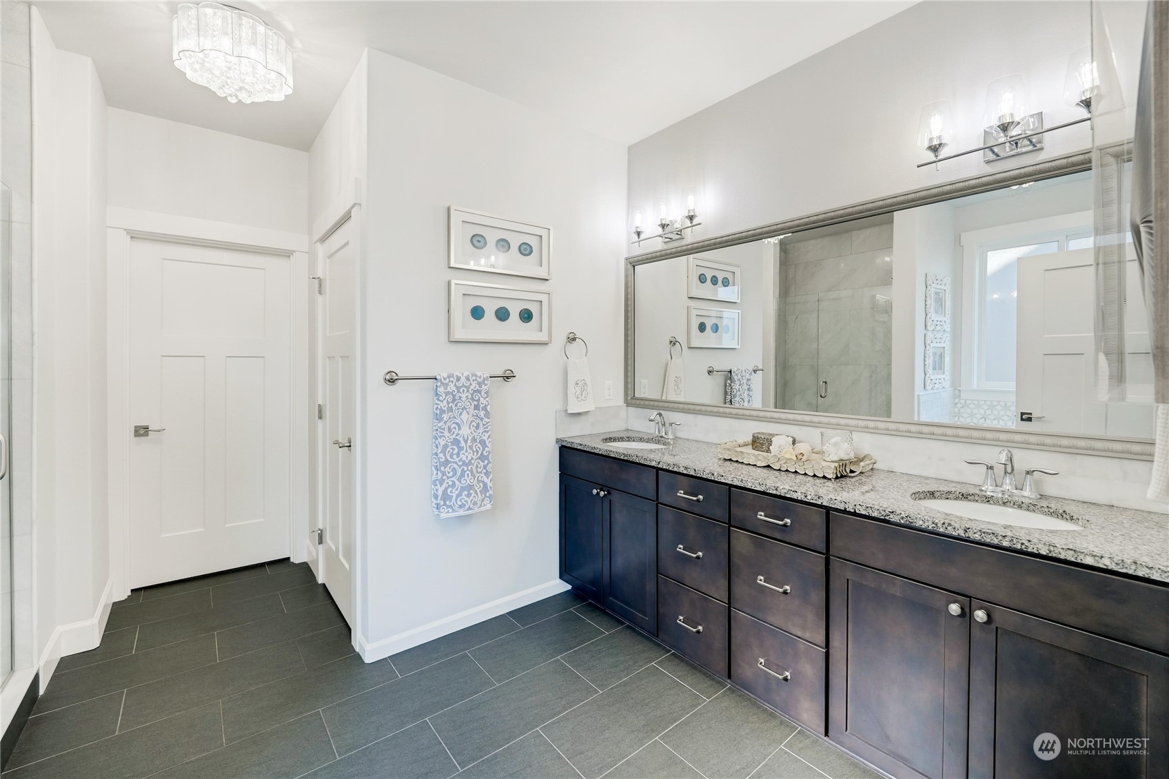 1520 Latitude Circle Anacortes, WA 98221 - Photo 16 of 35 a spacious bathroom with a granite countertop double vanity sink mirror and