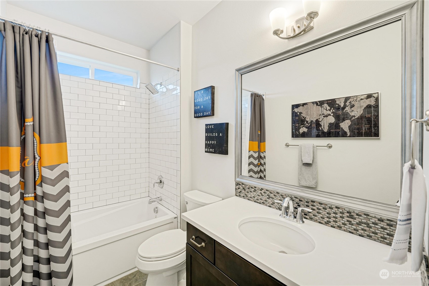 1520 Latitude Circle Anacortes, WA 98221 - Photo 20 of 35 a bathroom with a sink a toilet and shower curtain