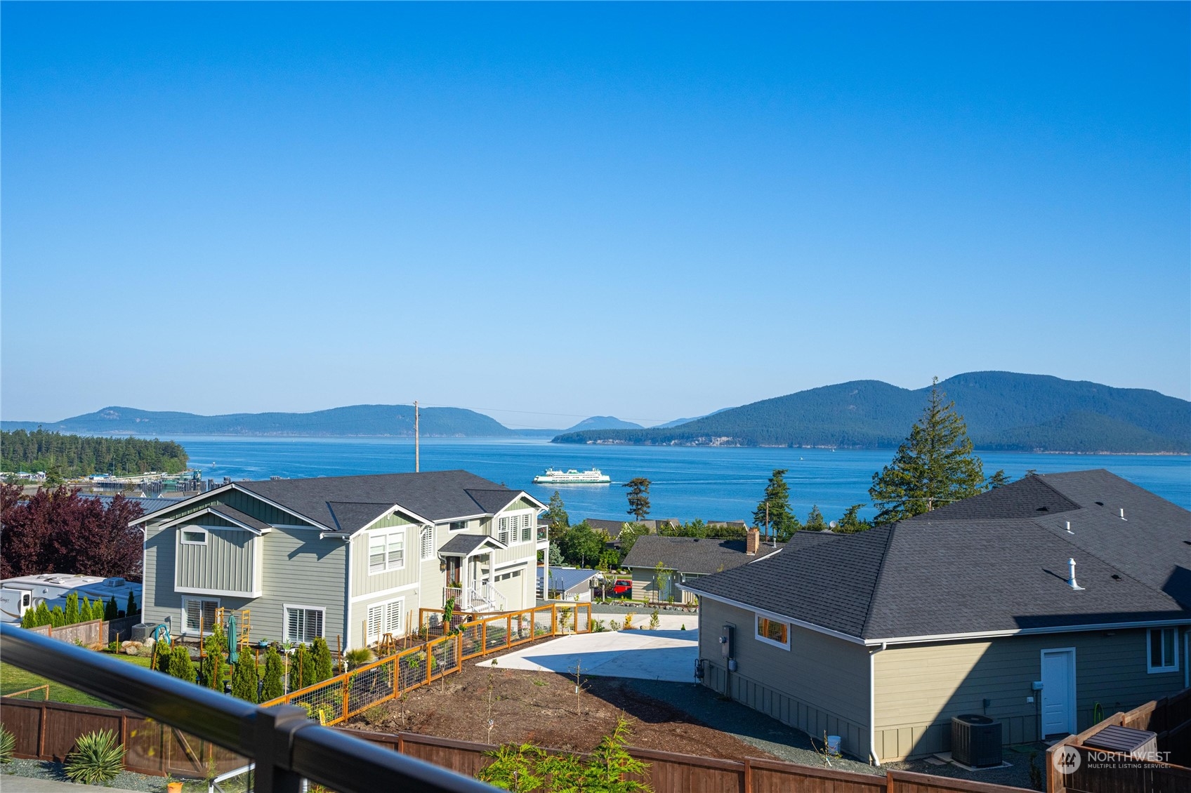 1520 Latitude Circle Anacortes, WA 98221 - Photo 2 of 35 an aerial view of residential houses and car parked
