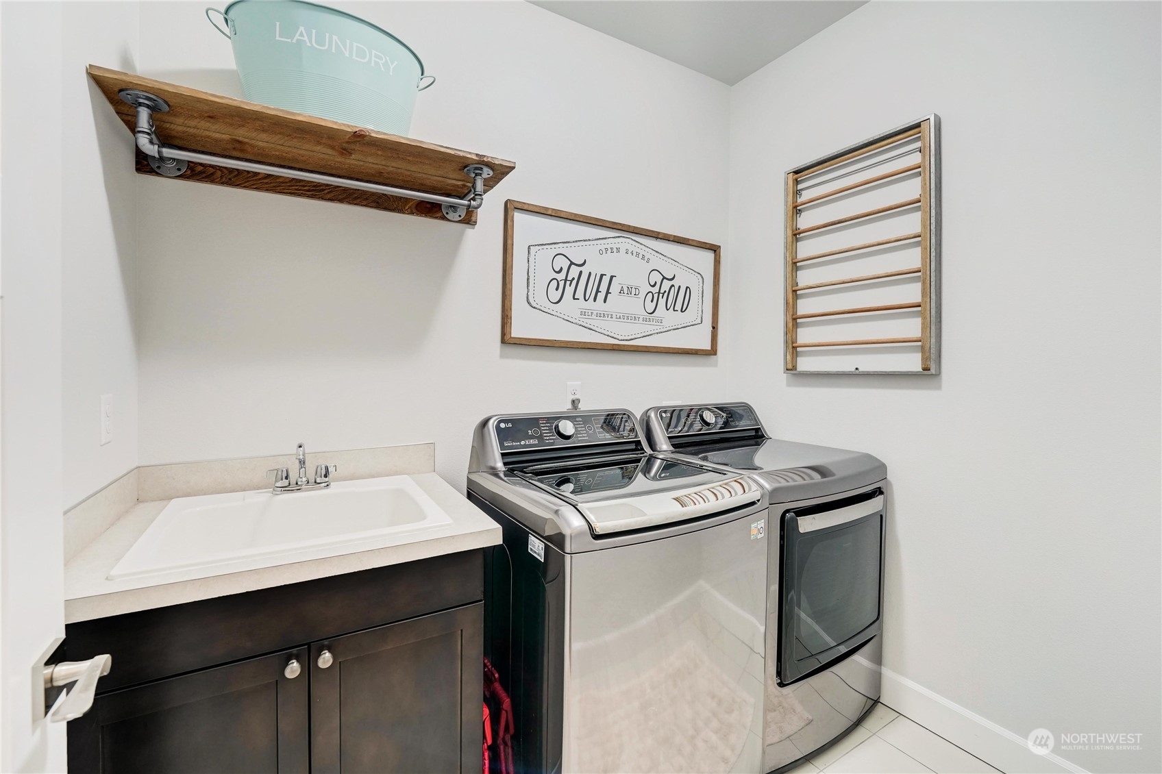 1520 Latitude Circle Anacortes, WA 98221 - Photo 21 of 35 a utility room with dryer and washer