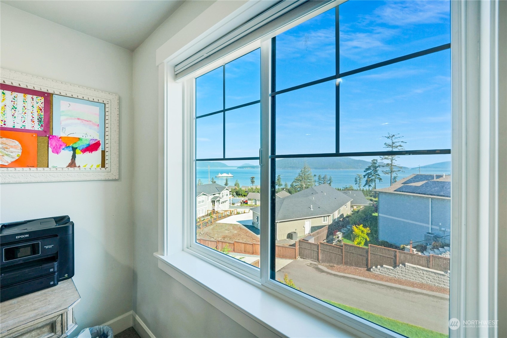 1520 Latitude Circle Anacortes, WA 98221 - Photo 23 of 35 a room with wooden floor and window