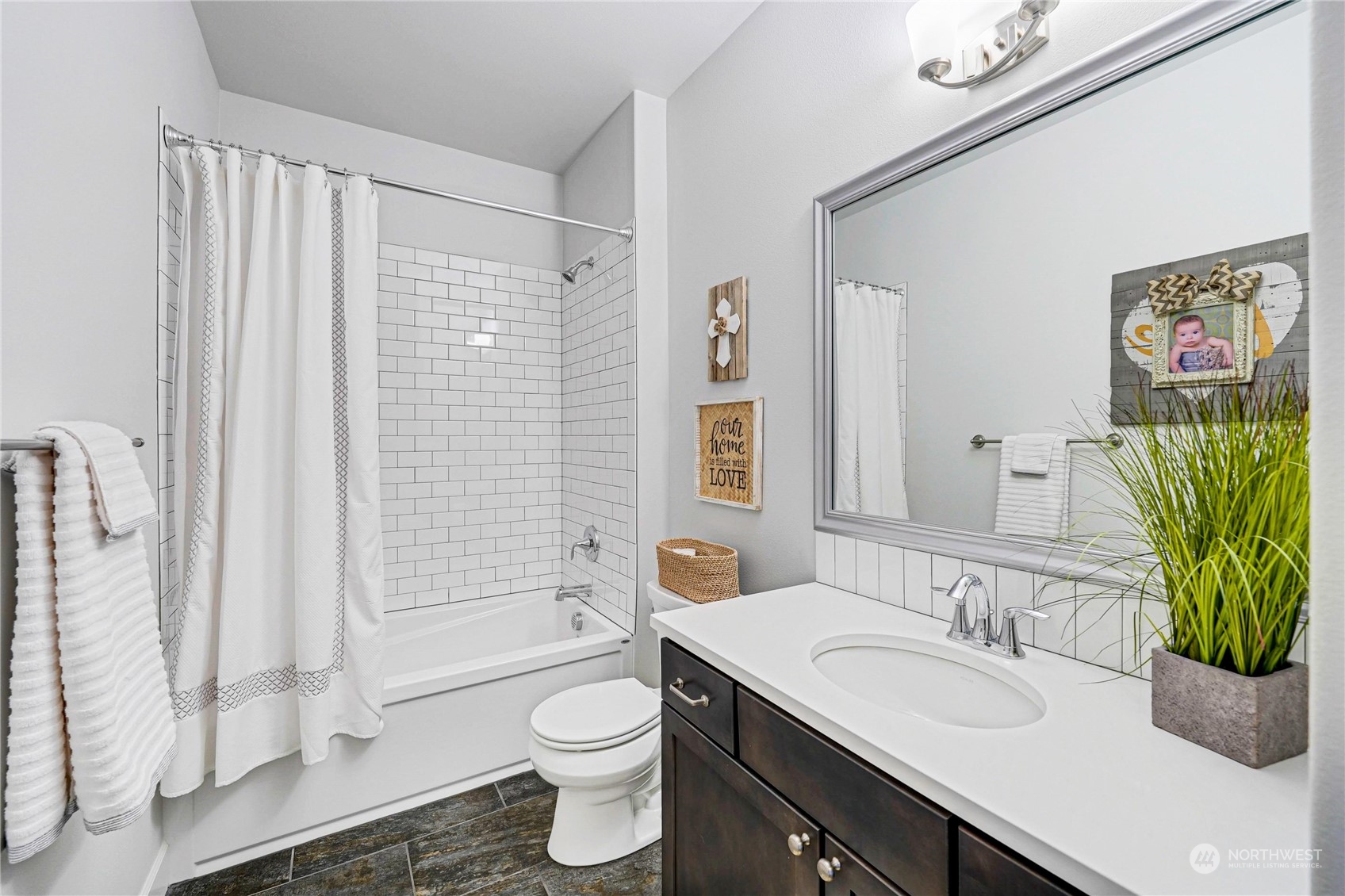 1520 Latitude Circle Anacortes, WA 98221 - Photo 30 of 35 a bathroom with a granite countertop sink toilet and shower