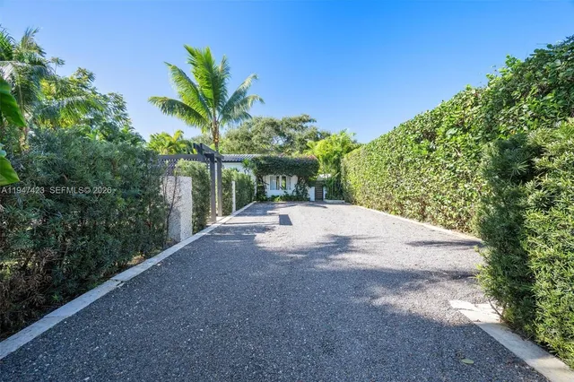 a view of a road with a yard