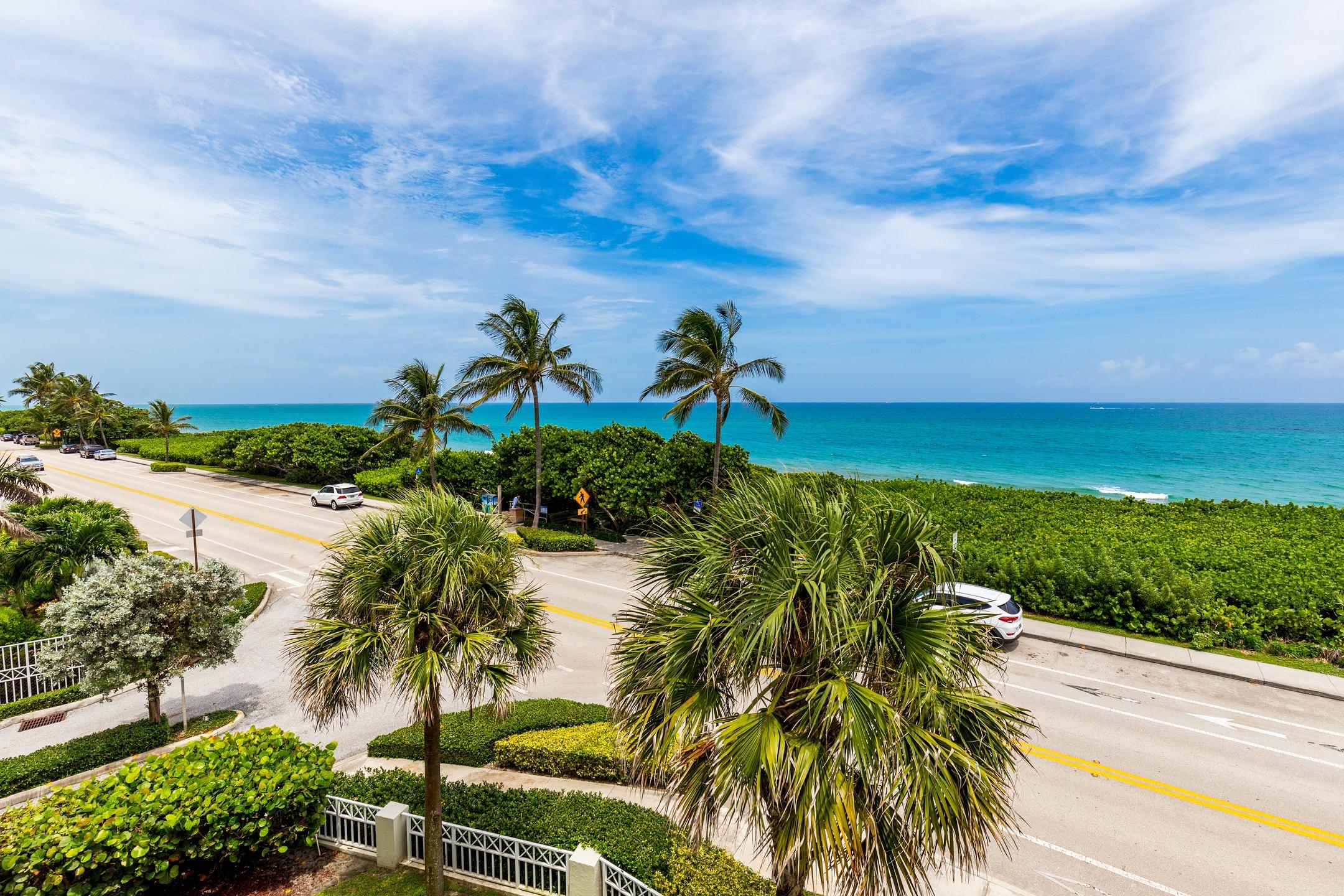 2050 Florida A1A, Unit 3 Jupiter, FL 33477 - Photo 36 of 36 a view of a lake with a yard