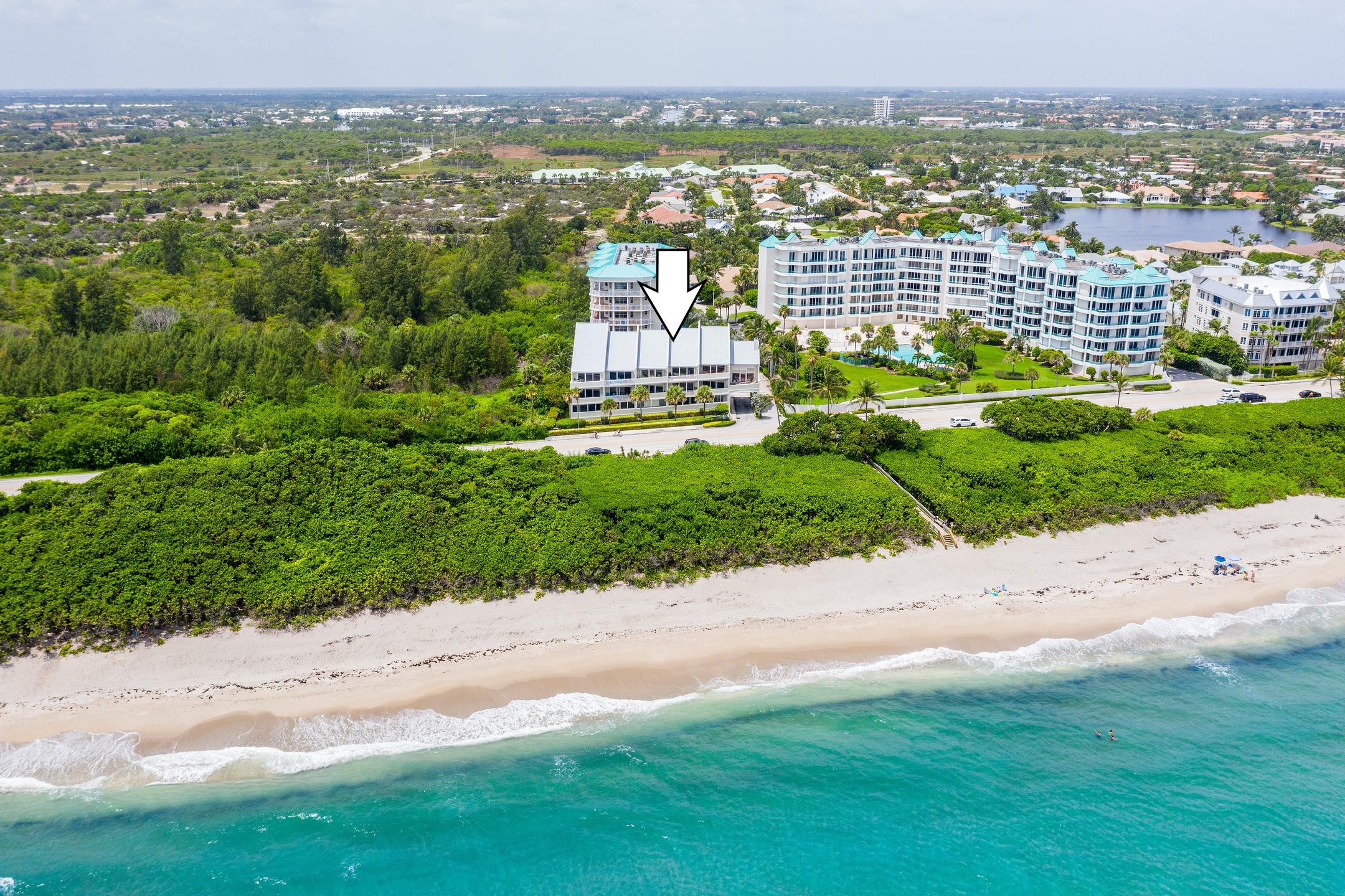 2050 Florida A1A, Unit 3 Jupiter, FL 33477 - Photo 6 of 36 an aerial view of multiple house