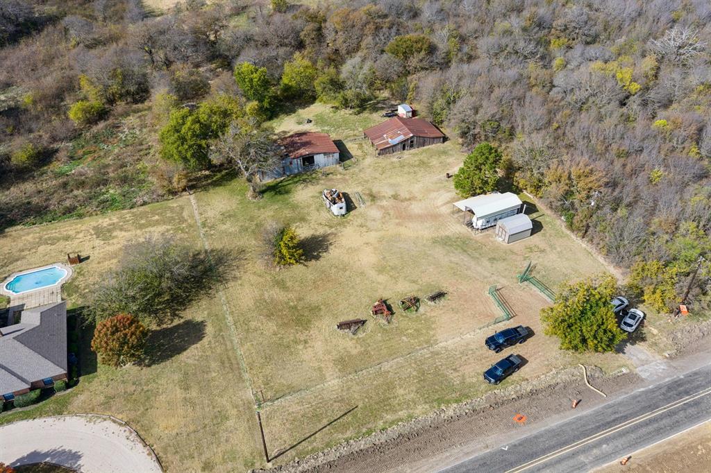 10127 Farm To Market Road 1385 Pilot Point, TX 76258 - Photo 15 of 16 a view of a backyard of a house