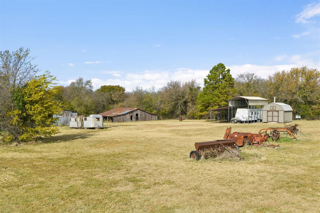 10127 Farm To Market Road 1385 Pilot Point, TX 76258 - Photo 9 of 16 a view of a houses with a yard