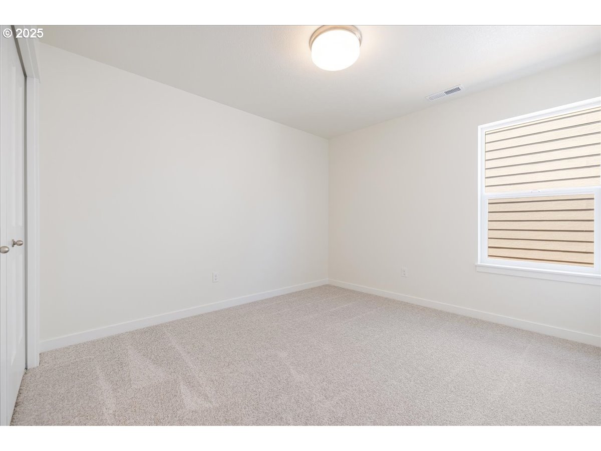 1449 Southeast Hankel Street Dallas, OR 97338 - Photo 11 of 19 a view of an empty room