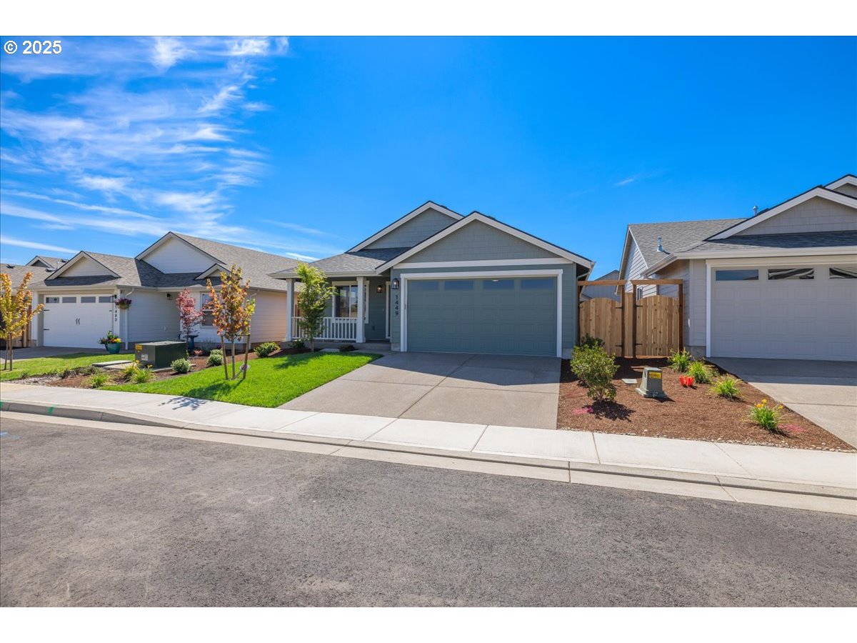1449 Southeast Hankel Street Dallas, OR 97338 - Photo 18 of 19 a house with a outdoor space