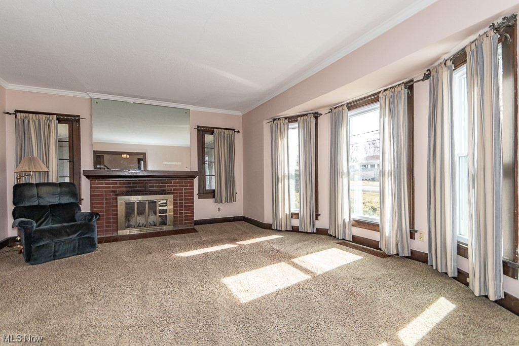 29396 Detroit Road Westlake, OH 44145 - Photo 7 of 30 Newer Carpeted living room with brick wood burning fireplace