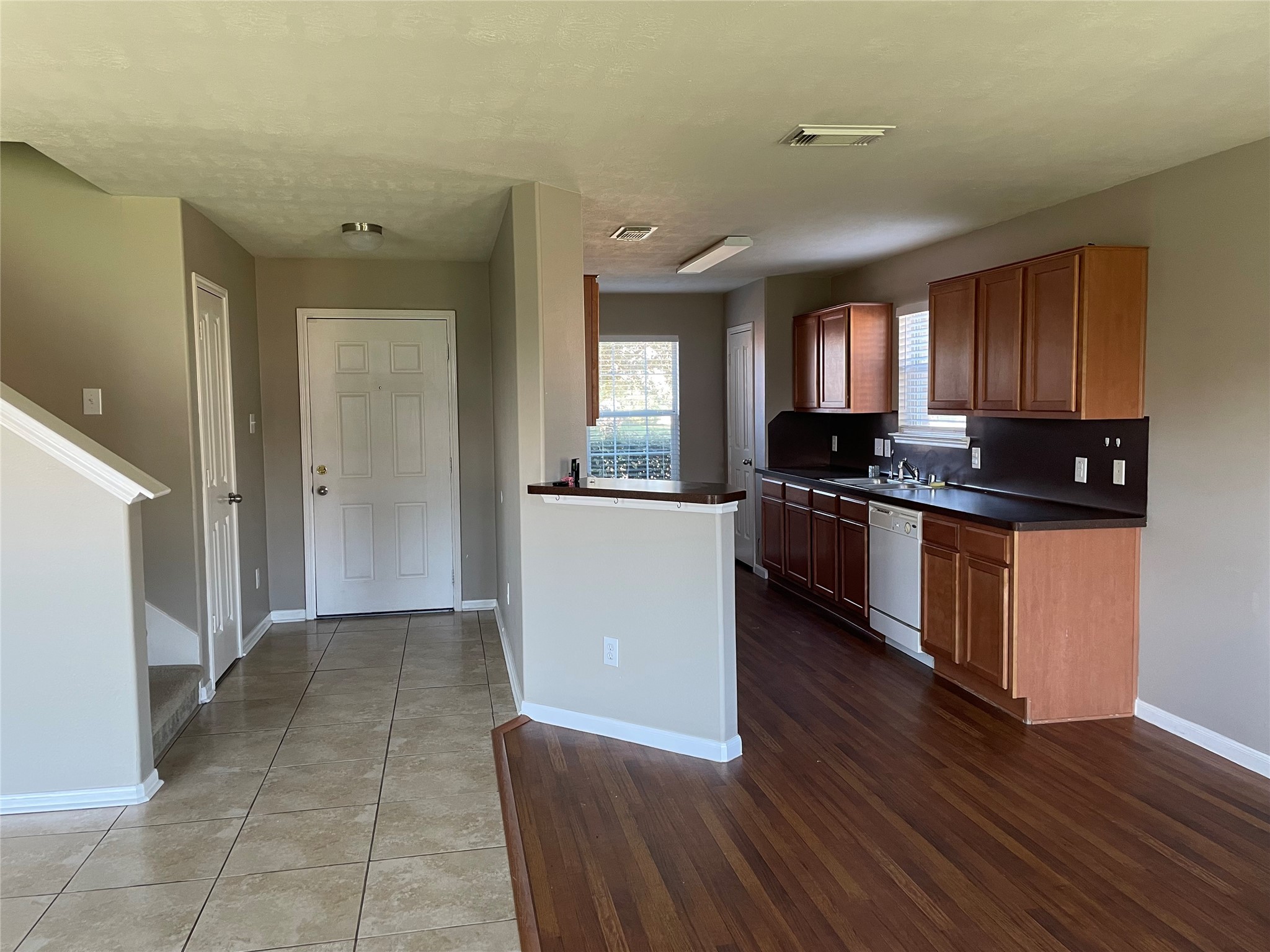 8103 Katie Mill Trail Spring, TX 77379 - Photo 20 of 36 a kitchen with granite countertop a stove top oven and cabinets