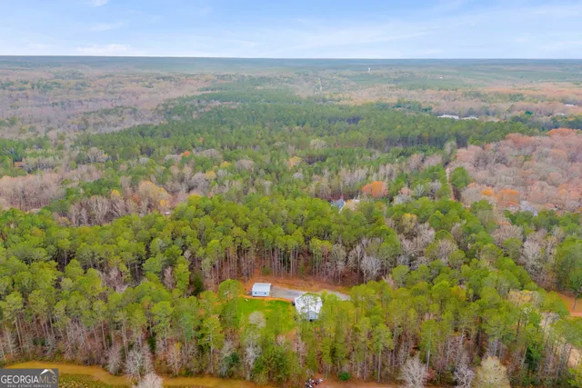 a view of outdoor space with signage and flags