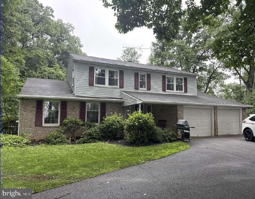 1445 Pleasant Valley Road South Westminster, MD 21158 - Photo 31 of 31 a house view with a garden space