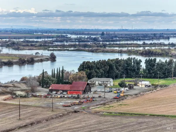 a view of a swimming pool with an outdoor space and seating area