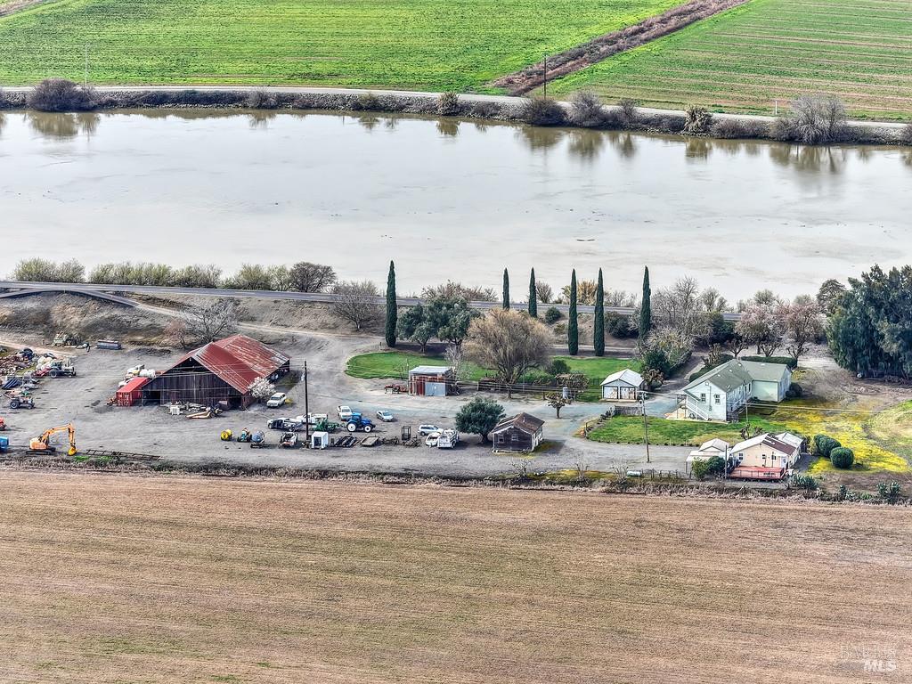 3834 Highway 84 Walnut Grove, CA 95690 - Photo 12 of 84 a view of a lake with lawn chairs