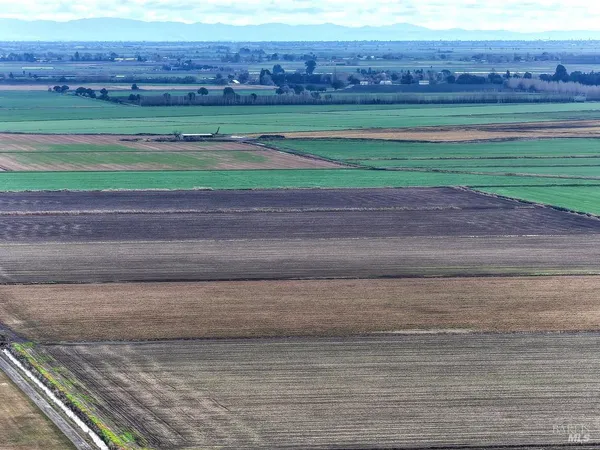 a view of swimming pool with seating area