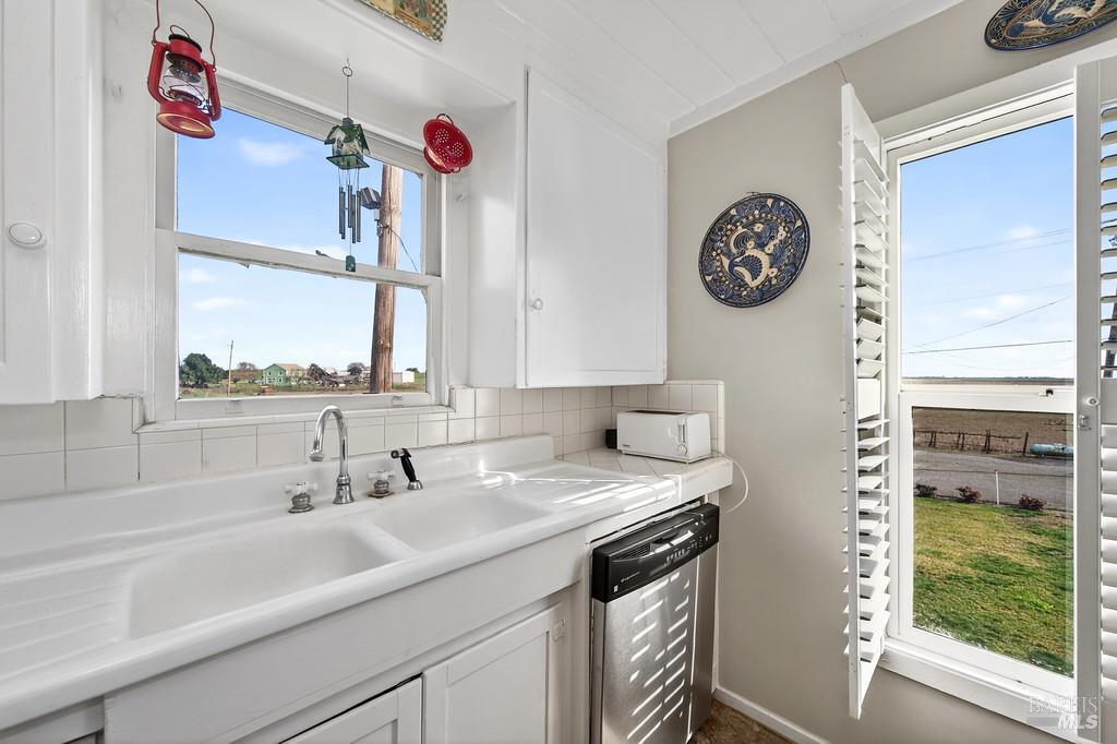 3834 Highway 84 Walnut Grove, CA 95690 - Photo 68 of 84 a bathroom with a sink and a mirror