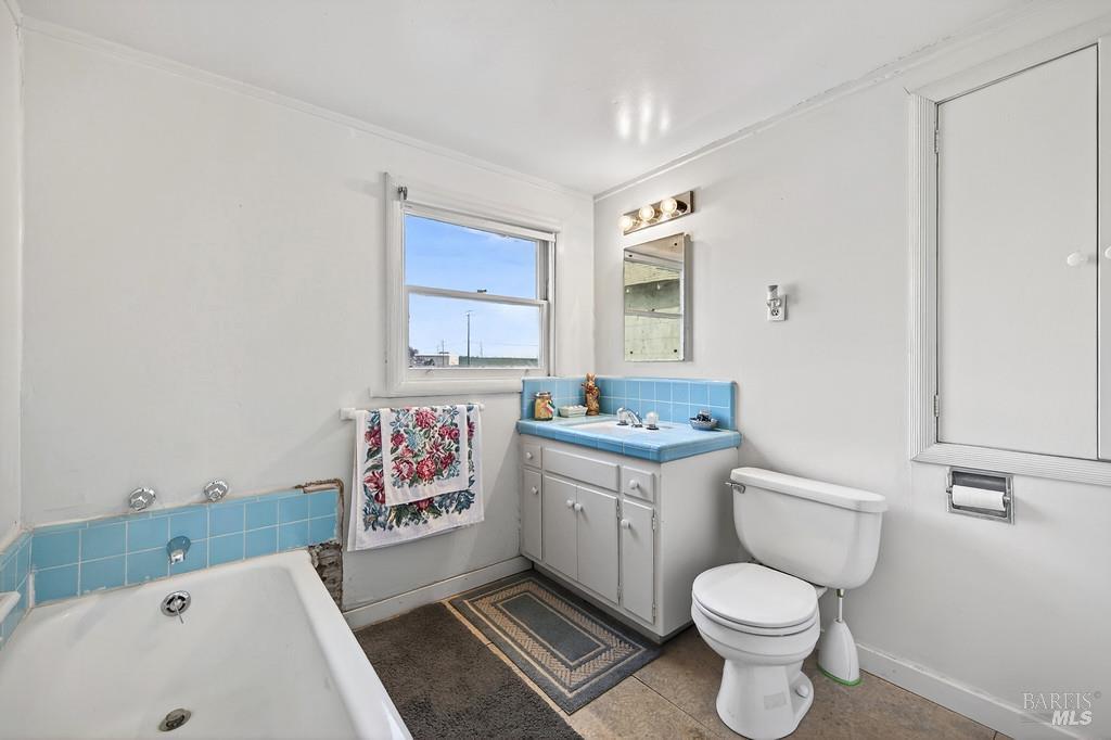 3834 Highway 84 Walnut Grove, CA 95690 - Photo 69 of 84 a bathroom with a sink toilet and a bathtub